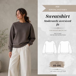 Puede incluir: Un patrón de costura en PDF para una sudadera de corte moderadamente oversize. El texto incluye "PDF SEWING PATTERN", "Sweatshirt", "Moderately oversized fit", "FOR HEIGHT: 168 CM / 5'6"", "EASY TO SEW STEP-BY-STEP INSTRUCTIONS", "SIZE XS-3XL" y "A0 • A4 • US LETTER".