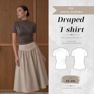 May include: A PDF sewing pattern for a draped T-shirt with a high neckline and short sleeves. The document includes technical line drawings of the front and back, size range XS-3XL, and is designed for a height of 160 cm. Includes A0, A4, and US Letter formats.