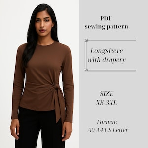 Könnte beinhalten: Eine Frau trägt ein braunes Langarm-Oberteil mit drapiertem Knotendetail. Der Text im Bild lautet: "PDF sewing pattern", "Longsleeve with drapery" und "SIZE XS-3XL". Das Format ist A0/A4/US Letter.