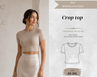 May include: A PDF sewing pattern for a crop top featuring a short-sleeved, round-neck design. The document includes text for height 168 cm/5'6", easy to sew step-by-step instructions, and sizes XS-3XL, with formats for A0, A4, and US letter paper.