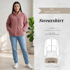 Peut inclure: Un patron de couture PDF pour un sweat-shirt, présentant une veste zippée en polaire rose poudré avec un col montant et des poches avant. Le graphique inclut un dessin technique du vêtement, le texte "PDF SEWING PATTERN", "Sweatshirt", "FOR HEIGHT: 160 CM / 5'3", "EASY TO SEW STEP-BY-STEP INSTRUCTIONS", "SIZE XS-3XL" et "A0 • A4 • US LETTER".