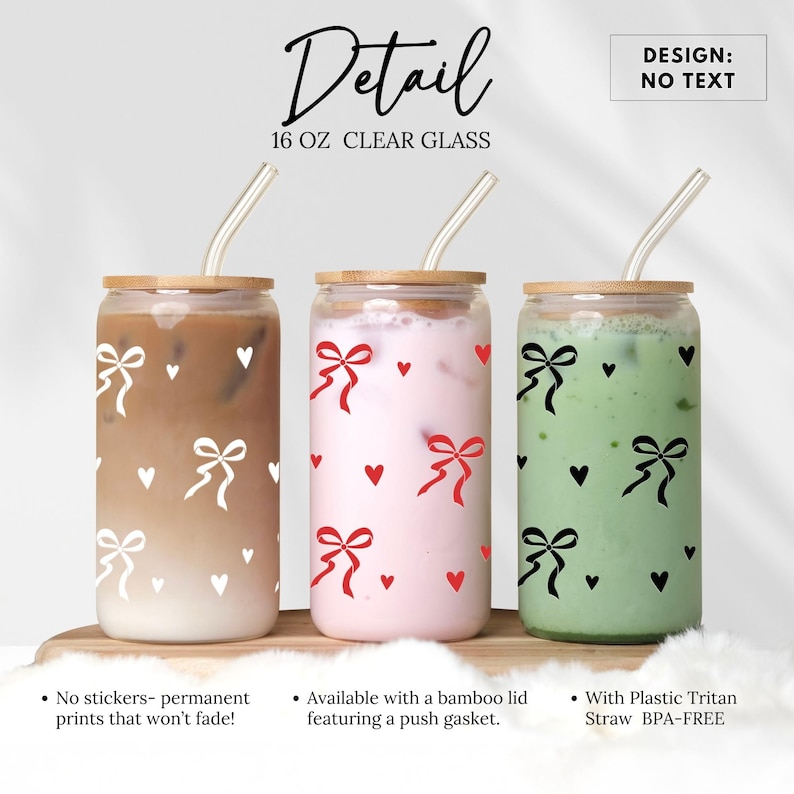 May include: Three 16 ounce clear glass tumblers with bamboo lids and reusable straws. The tumblers have a white, red, and black pattern of bows and hearts.  DESIGN: NO TEXT