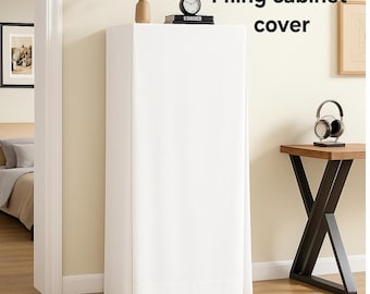 May include: A tall, rectangular filing cabinet cover in solid white fabric. The cover drapes over the cabinet, reaching the floor with clean, straight lines. The text "Filing cabinet cover" is printed in black on the upper right side.