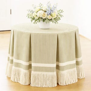 Ticking stripe tableskirt with grosgrain and bullion fringe trim pleated round or rectangular skirt , skirted table