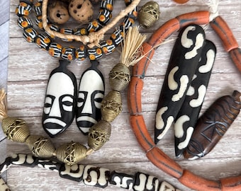 African bone and glass brass design sets, black orange mix, African mask pendant,  Fast pics fast ship, priced below retail