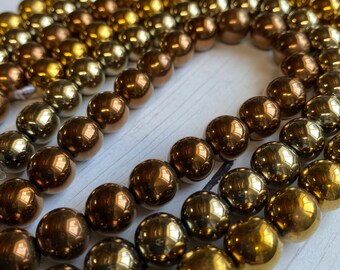10mm round hematite in three metal colors, 40 beads per strand, smooth weighted with lots of shine