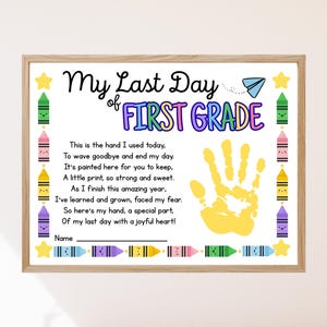 May include: A framed print for the last day of first grade. The print features the text "My Last Day of First Grade" in black and colourful letters. A yellow handprint is in the centre, with a poem below. Colourful crayon illustrations and stars decorate the border.
