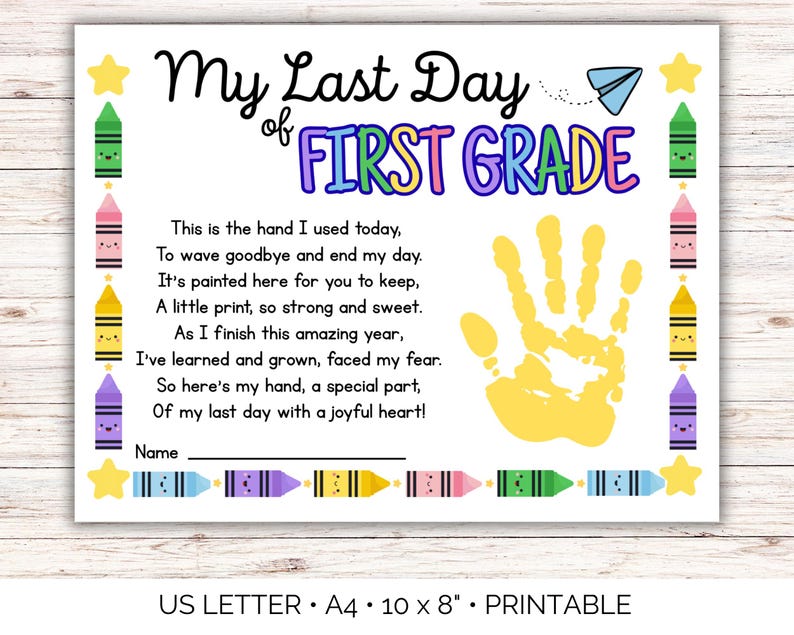 May include: A printable A4 document with the text "My Last Day of First Grade." The design includes a yellow handprint, colourful crayons, stars, and a paper airplane. The document is 25.4 x 20.3 cm.