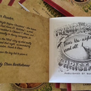 May include: A vintage book with a white cover and black text. The title is "The Fright Before Christmas" with the text "Twas the night and all" underneath. The book is published by Bumblebat.