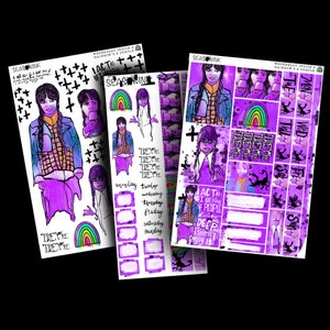 May include: A collection of purple and white planner stickers featuring illustrations of a character with black braids, a rainbow, and text. The stickers include phrases like "They're" and "I act as if I don't care".