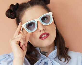 Cute cream sunglasses with heart shaped blue tinted lenses - DOLLY