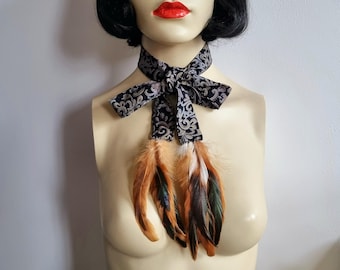 Feather Bolan necktie navy paisley scarf with tan feathers