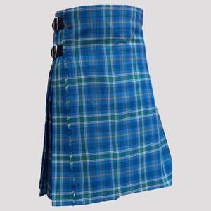 May include: A blue, green, and white plaid kilt with black buckles.