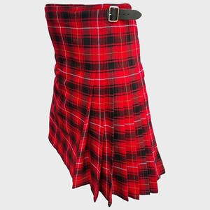May include: A red, black and white tartan kilt with a brown leather belt.