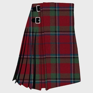 Puede incluir: Un kilt tradicional con un patrón de cuadros rojos, verdes y azules. El kilt tiene dos correas de cuero con hebillas plateadas. El diseño es plisado y la tela muestra un patrón de tartán.