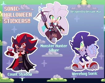 May include: Three Halloween-themed stickers featuring Sonic the Hedgehog characters. The first sticker shows Shadow the Hedgehog dressed as a vampire, holding a glass of red liquid. The second sticker shows Silver the Hedgehog dressed as a monster hunter, holding a crossbow. The third sticker shows Sonic the Hedgehog dressed as a werewolf. The text "SONIC HALLOWEEN STICKERS!!" is at the top of the image. The text "Designed by Deviant_Mai" is at the top right of the image. The text "Count Shadow" is below the first sticker. The text "Monster Hunter Silver" is below the second sticker. The text "Werehog Sonic" is below the third sticker.