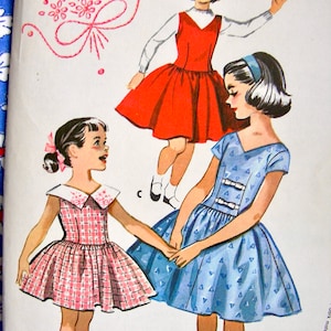 RARE / UNCUT * 1950s Vintage McCall&#39;s Pattern 2179  -  Little Girls&#39; Dress with Bows and Embroidery Transfers  - Size 6, bust 24&quot;