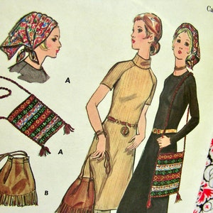 May include: Two women wearing head scarves and dresses with fringe bags. One bag is brown with fringe and the other is a colorful woven bag with fringe.