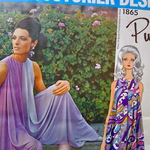 May include: Vintage fashion magazine cover featuring a woman in a flowing purple dress and a cutout of a woman in a patterned dress. The cover includes the text "Pucci of Italy" and the number "1865".