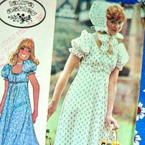 May include: A vintage sewing pattern featuring a white dress with a polka dot pattern and a white bonnet. The dress has a gathered neckline and short puffed sleeves. The pattern is from Laura Ashley.