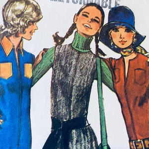 May include: A vintage sewing pattern illustration featuring three outfits: a blue jumpsuit with orange pockets, a grey herringbone sleeveless dress with a green turtleneck and black belt, and a rust-colored jumpsuit with a matching blue hat.