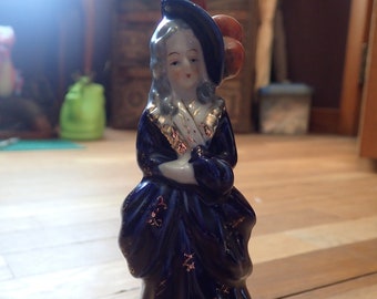 Hand painted colonial lady figurine made in occupied Japan