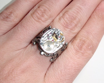 Silver tone Steampunk Victorian 22 jewel clock ring with rubies