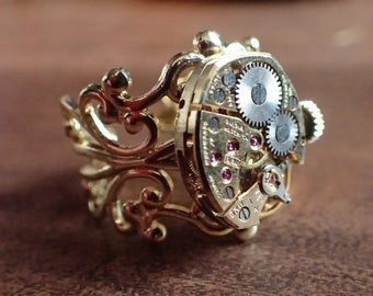 Gold tone Steampunk Victorian 17 jewel clock ring with rubies