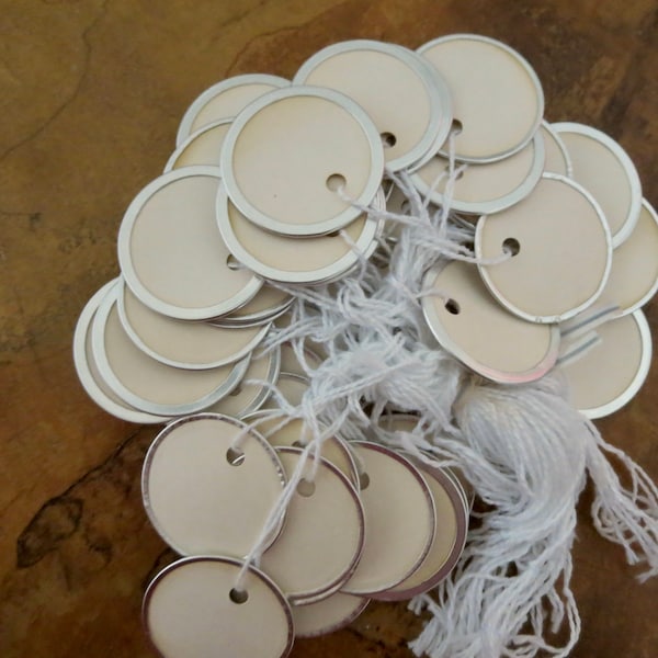 50 Vintage round white 1 1/4" paper tags with metal rims naturally age discolored