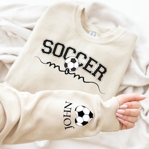 Personalize Soccer Mom Kids Name On Sleeve Sweatshirt, Mom Soccer Sweater, Soccer Mama Shirt, Gift for Soccer Mom, Fall Soccer Season Shirt