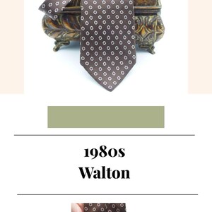 May include: A brown necktie featuring a repeating pattern of small white circular motifs. The tie has a pointed end and a rectangular label on the back that reads Walton Clothes. The fabric displays a consistent geometric print throughout the length.