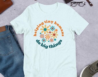Helping tiny humans do big things Teacher Unisex t-shirt