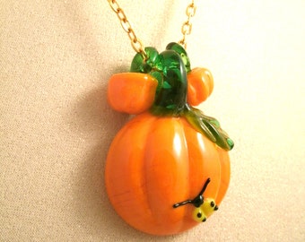 Pumpkin lampwork Glass necklace with small lampwork glass pumpkins on gold plated chain