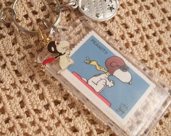 Flying Ace Vintage New snoopy stamp  unused vintage Stamp Key Chain clip with beagle charm and I love you to the moon and back charm