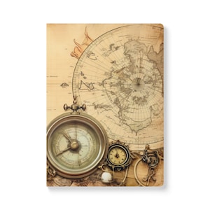 May include: A vintage compass with a brass finish and a map of the world in the background. The compass has a white face with black markings and a gold needle. The map is old and faded, with brown and yellow tones.