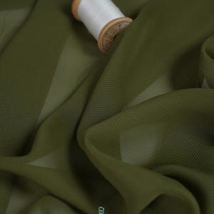 green color dress material Green color crepe silk printed women unstitched dress material