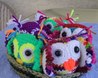 Nest full of baby owls