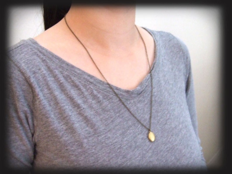 CUTE AS A BUTTON tiny vintage brass locket necklace
