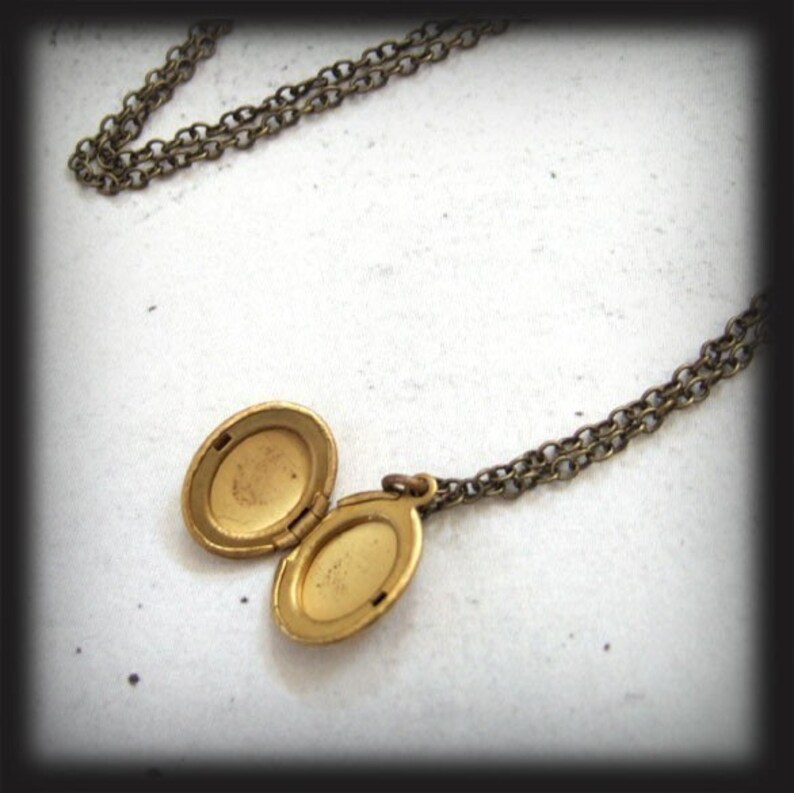 CUTE AS A BUTTON tiny vintage brass locket necklace