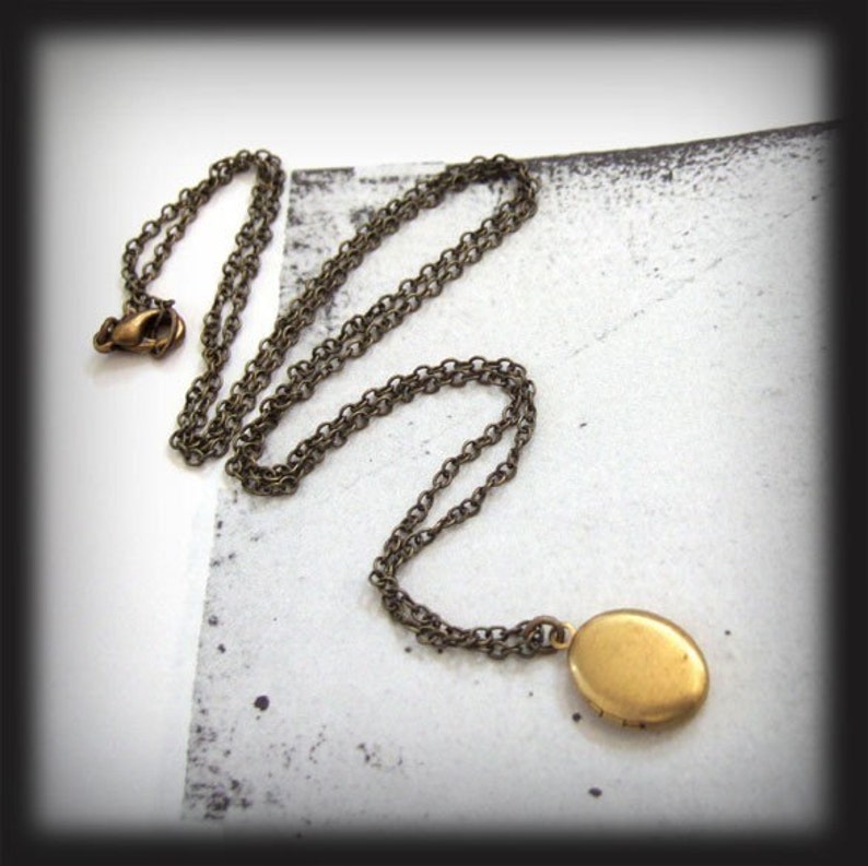 CUTE AS A BUTTON tiny vintage brass locket necklace