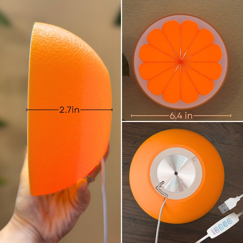 K&ouml;nnte beinhalten: Eine orangefarbene LED-Lampe in Form einer Frucht mit texturierter Schalenoberfl&auml;che. Die Vorderseite zeigt ein leuchtendes Zitrusfrucht-Muster. Die Lampe ist 6,86 cm tief und hat einen Durchmesser von 16,26 cm. Inklusive wei&szlig;em USB-Kabel.