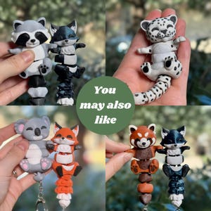 Four-panel You May Also Like collage of 3D printed articulated flexi animal keychain pairs. Top left: Raccoon and Galaxy Fox. Top right: Leopard in a palm. Bottom left: Koala and Classic Orange Fox. Bottom right: Red Panda with Raccoon and Galaxy Fox. 3D printed animal keychain fox raccoon leopard red panda koala articulated fidget bag charm cute animal gift