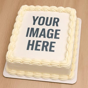 May include: A rectangular cake with white frosting and decorative yellow frosting around the edges. The cake has the text "YOUR IMAGE HERE" in dark blue letters on top. The cake sits on a white cardboard base.