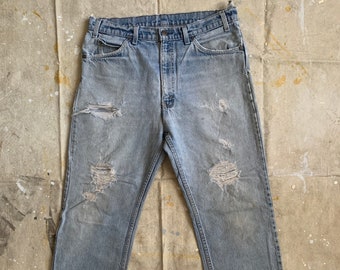 1980's Levi's 509 Orange Tag Jeans / vintage 80's distressed grunge grungy thrashed trashed denim pants made in USA waist 34"