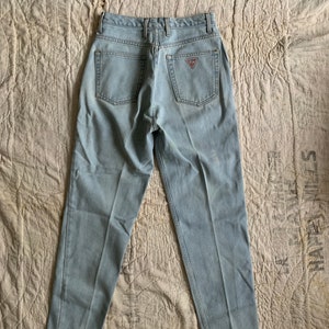 1980s GUESS Light Wash Denim Jeans / vintage 80’s high waist tapered leg mom jeans waist 27” made in USA