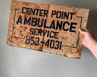 Vintage Center Point Ambulance Rusted Metal Sign / old rusty wall hanging tin advertising