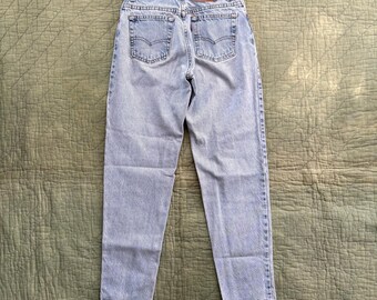 Vintage 1990s Levi’s 550 Jeans Made in USA - 26x29 / 90’s high waisted levis denim blue jeans waist 26” worn in distressed tapered