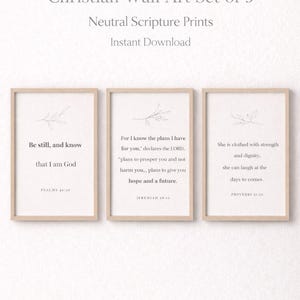 May include: Christian wall art set of 3, featuring neutral scripture prints. Each framed print displays inspirational quotes from Psalms, Jeremiah, and Proverbs. The artwork includes delicate botanical line drawings and is available for instant download.