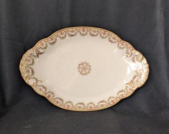 Antieke Limoges La Porcelaine Limousine and Lazarus Straus and Sons-schotel met bloemenversiering