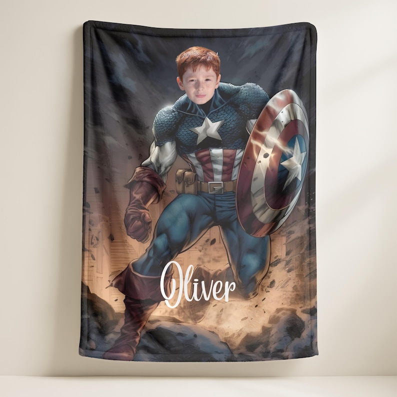 May include: A plush blanket featuring a digitally rendered image of Captain America with a child's face superimposed. The blanket showcases the superhero in his iconic costume, holding his shield. The name "Oliver" is written in a cursive font.